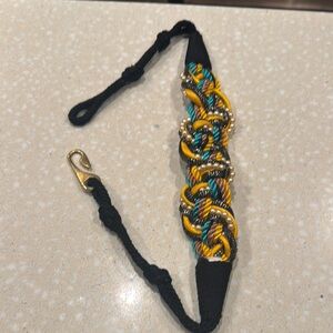 Elegant Black and Gold Belt with Braided Design